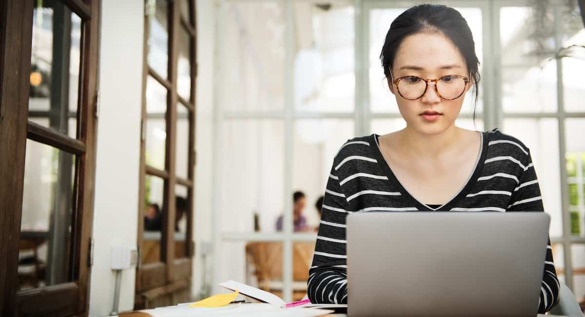 A JavaScript developer working on her code.