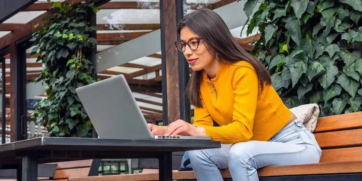 A woman reading an article about AVGS