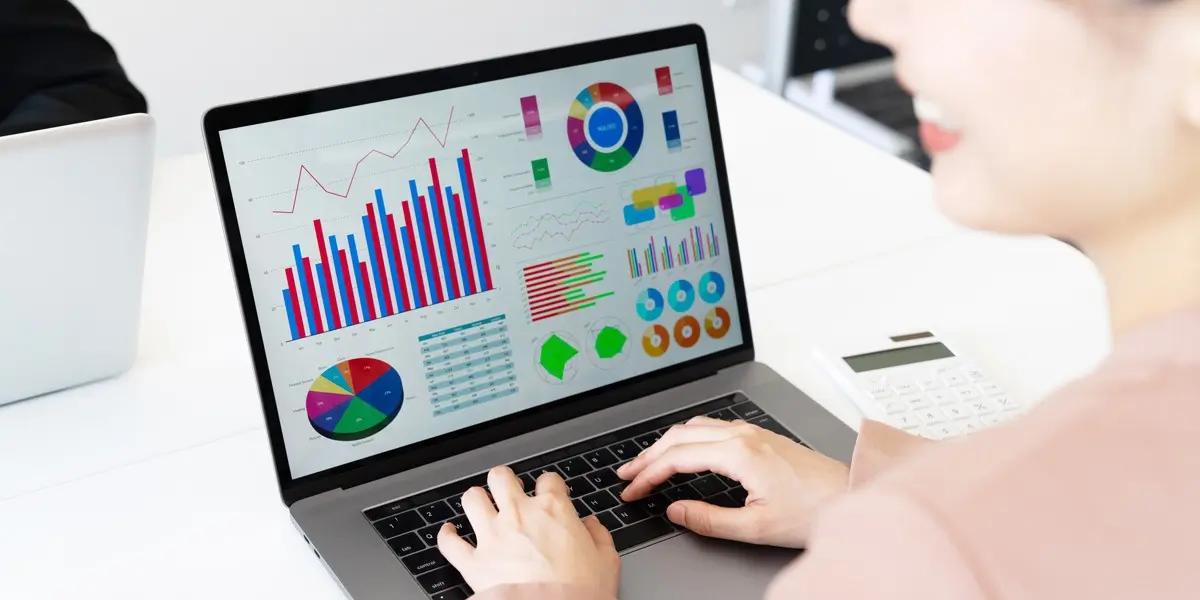 A data analyst using data analysis tools to create visualizations