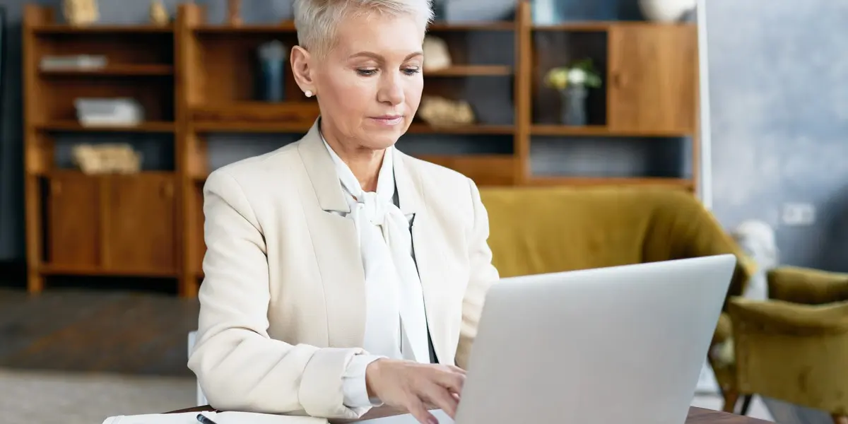 A data analyst building their portfolio on a laptop