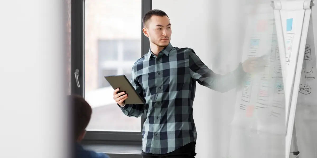 UX designer presenting ideas in an office