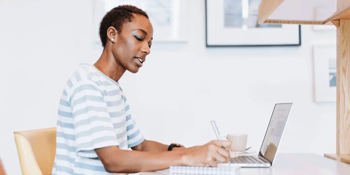 A UX researcher working at their home office