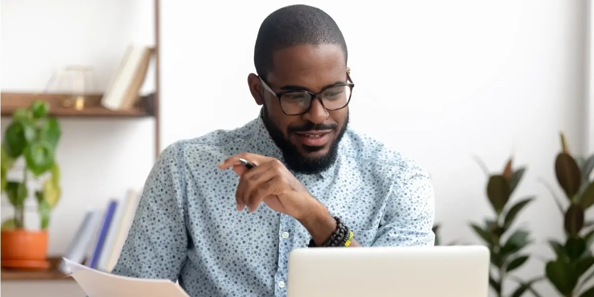 A data analyst looking at a computer