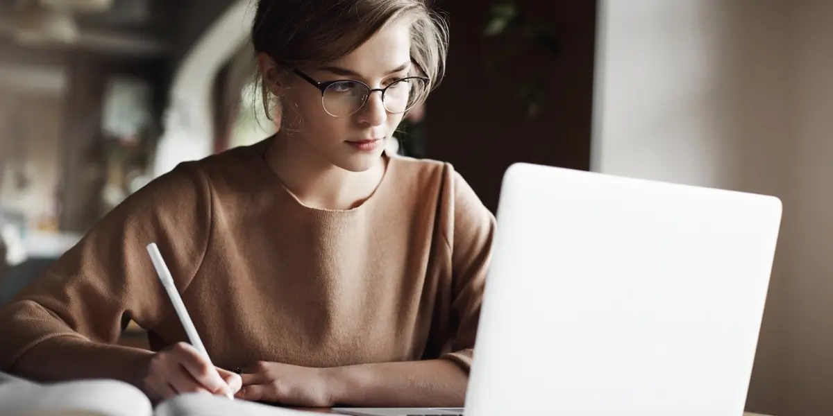 An aspiring designer working at a desk