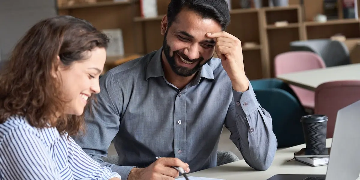 Students studying together to achieve their SEO certification