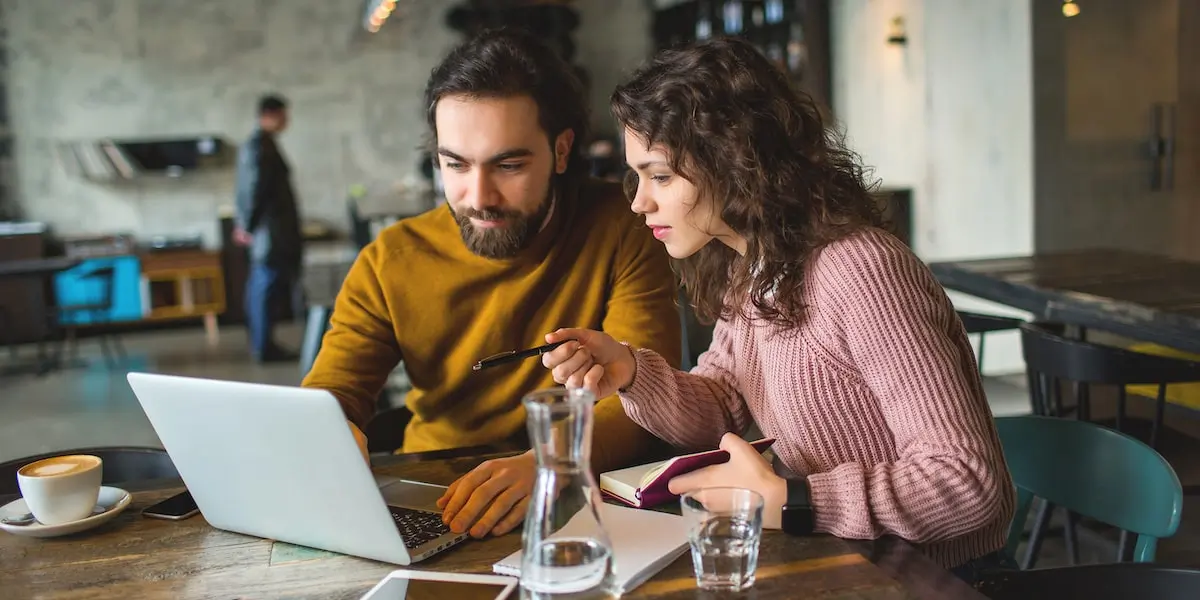 Two colleagues working at a digital marketing agency