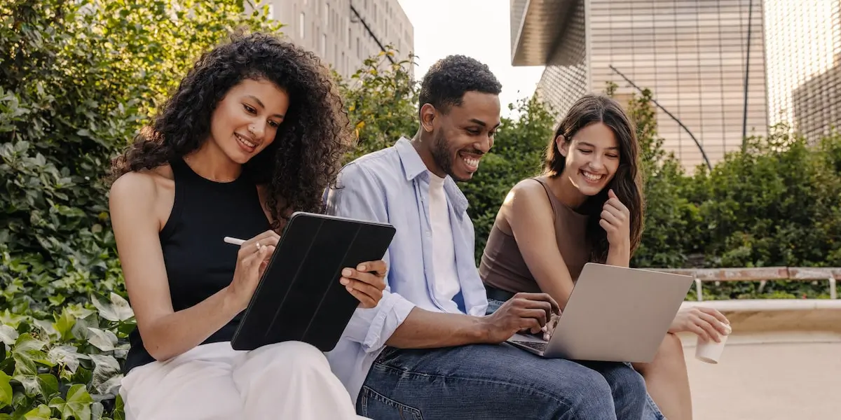 A group of digital marketing colleagues working outdoors