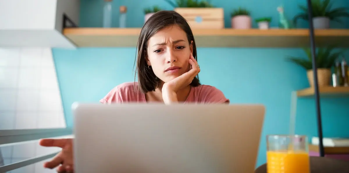 A developer responsible for AWS security stares at her computer in disbelief.