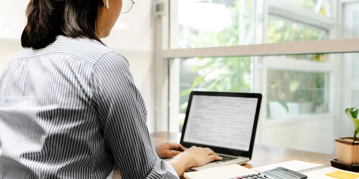 Woman working on building a relational database