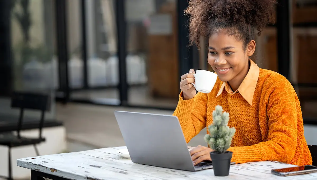 Young digital marketer does remote work at a cafe