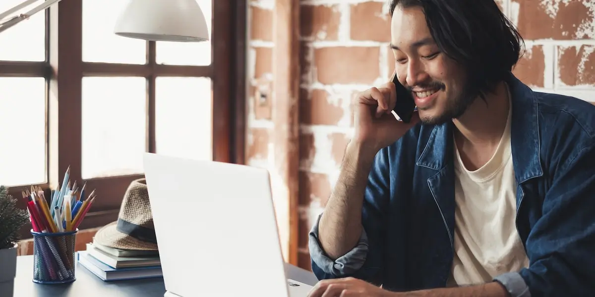 Person working from an office looking up content strategist salary ranges