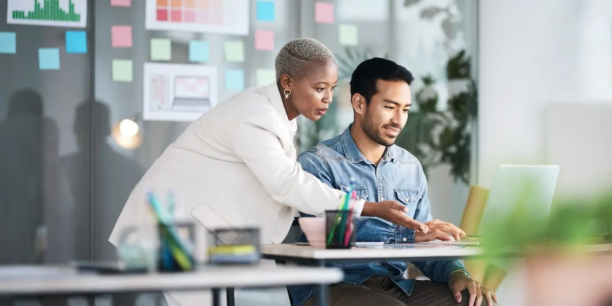 A mentor helping a man wondering should I be a product manager.