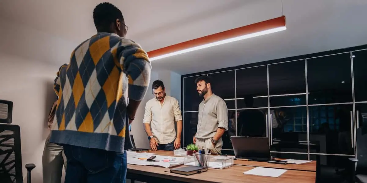 A product manager dealing with shiny object syndrome in a meeting with bosses.